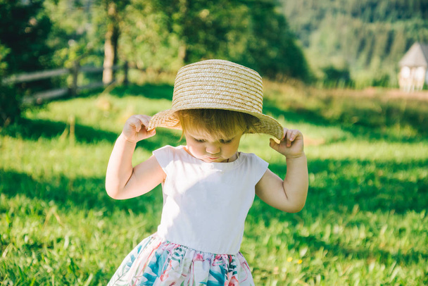 Little cute girl in the hat close-up portrait - Foto, imagen