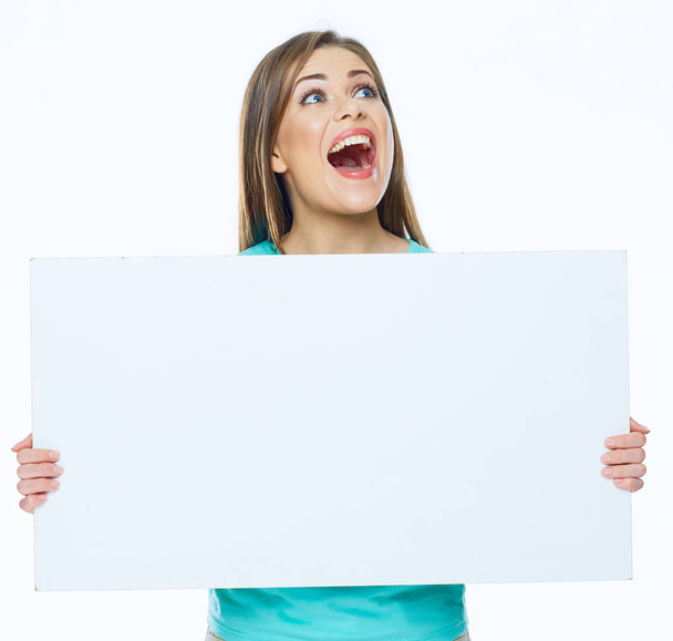 Beautiful emotional woman with big white board - Фото, зображення