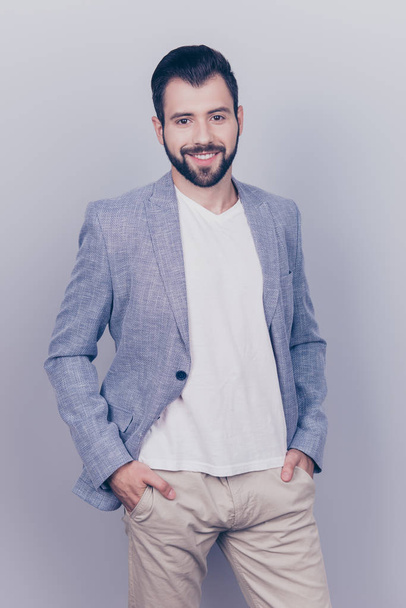 Young successful brunet bearded entrepreneur in casual smart is  - 写真・画像