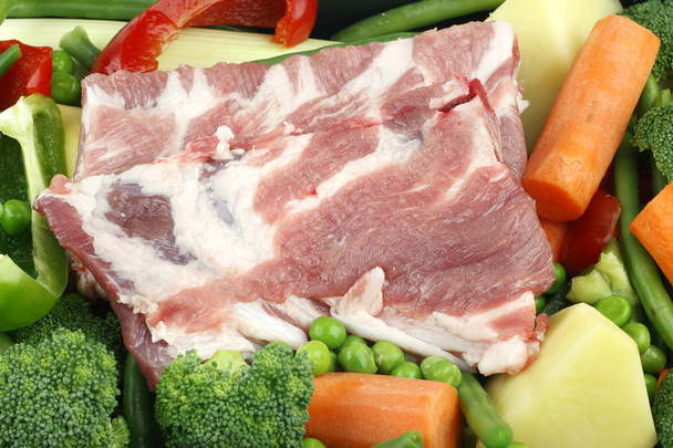 Pork meat and vegetable. - Фото, изображение