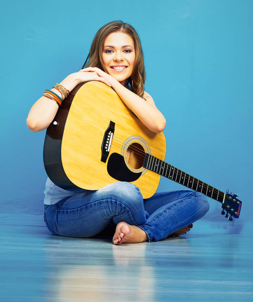 young model girl with acoustic guitar - Fotó, kép