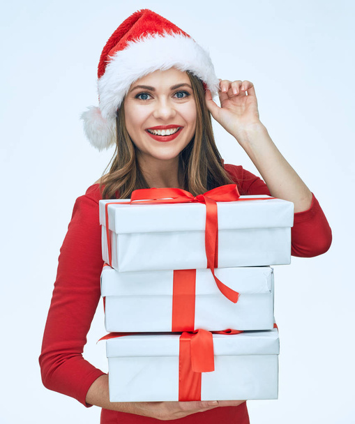 businesswoman in christmas hat holding boxes   - Foto, Imagen