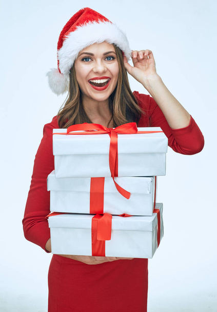 businesswoman in christmas hat holding boxes  - Foto, Imagem