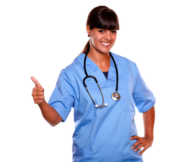 Charming nurse smiling and showing you ok sign - Φωτογραφία, εικόνα