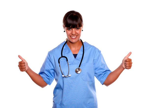 Positive young nurse with a stethoscope - Fotó, kép
