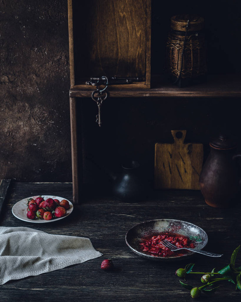 Fresh strawberry on black wooden table  - Foto, afbeelding