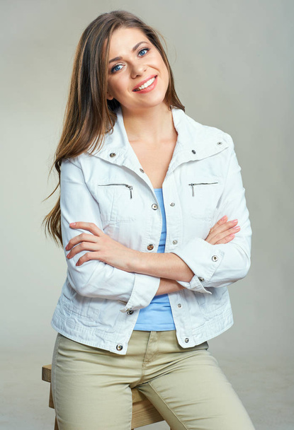 smiling woman wearing white jacket  - Φωτογραφία, εικόνα