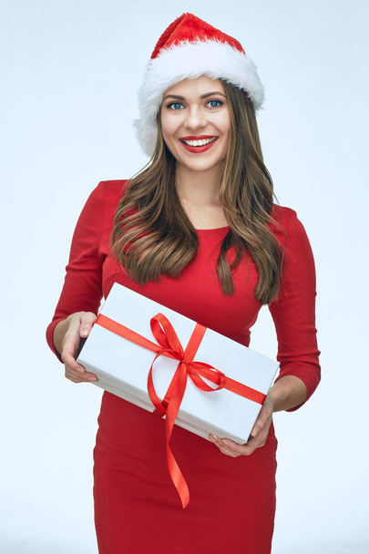 Smiling Santa girl holding gift box.  - Foto, Imagen