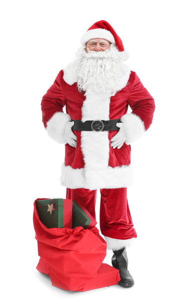 Authentic Santa Claus with big gift bag on white background - Photo, image