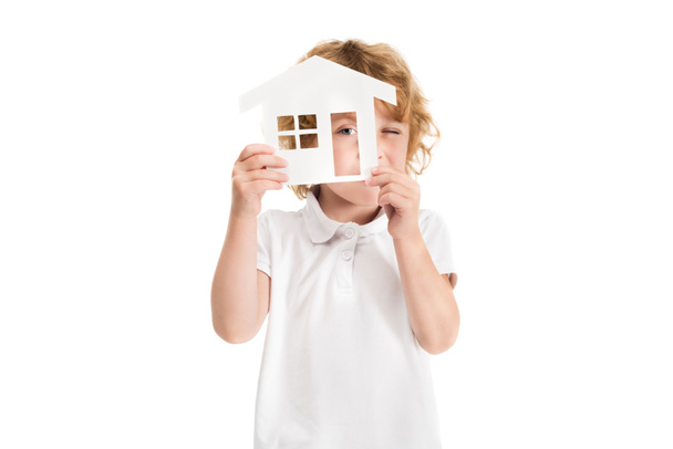 kid with house model - Foto, imagen