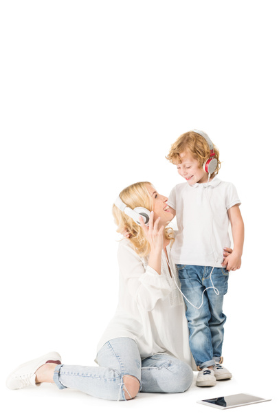 mother and son in headphones - Φωτογραφία, εικόνα