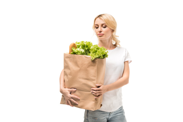woman with paper bag - Фото, изображение