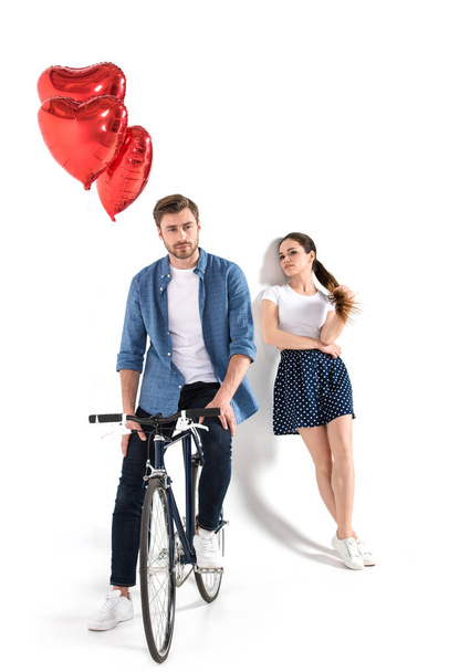 couple with bicycle and balloons - Photo, Image