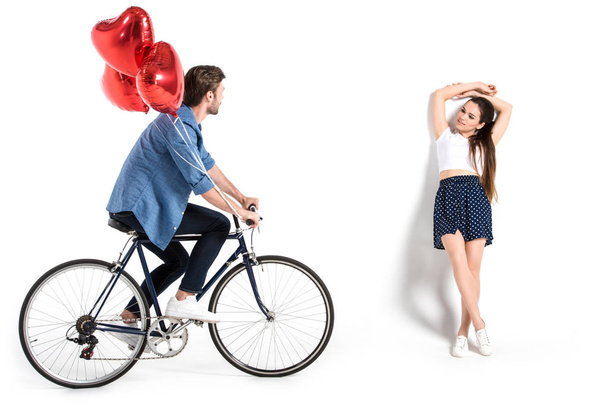 couple with bicycle and balloons - Fotó, kép