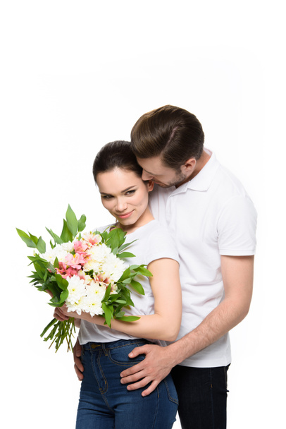 couple with bouquet of flowers - Photo, image