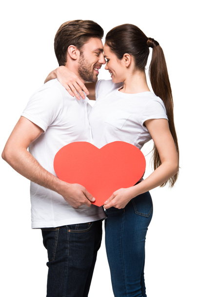 couple holding red heart - Fotografie, Obrázek