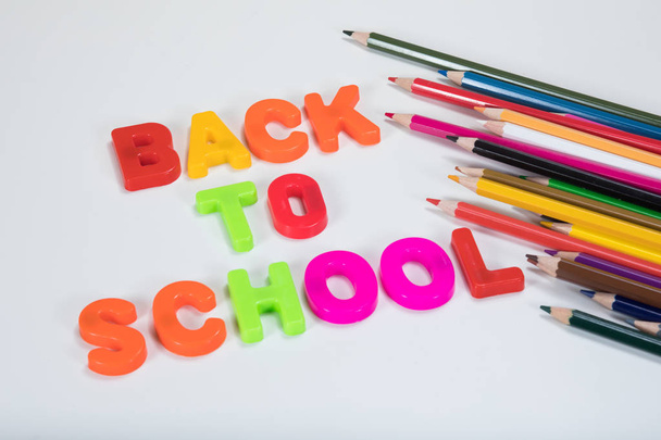 Back to school letters and multicoloured pencils - Photo, Image