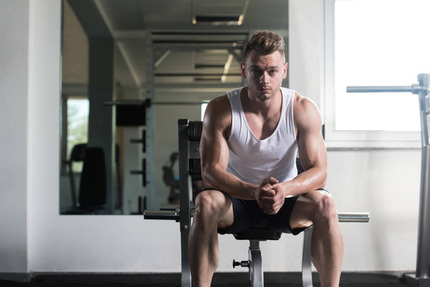 Male Resting On Bench In Fitness Center - Photo, image