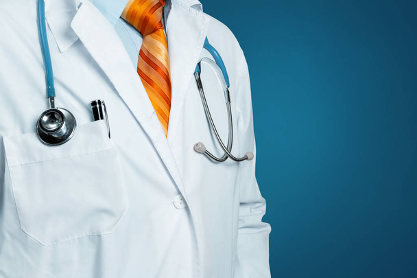 Doctor On Blue Background. Healthcare Medicine Insurance Concept - Photo, Image