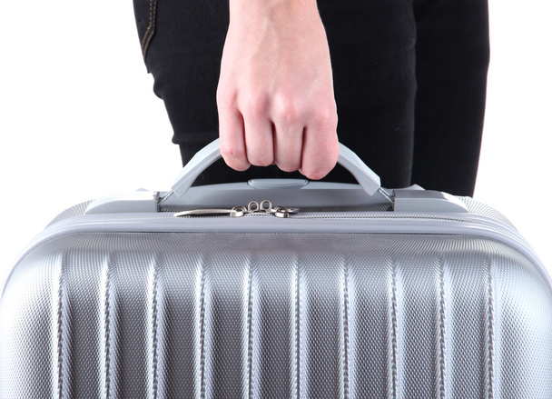 Holding suitcase in hand isolated on white - Foto, Bild