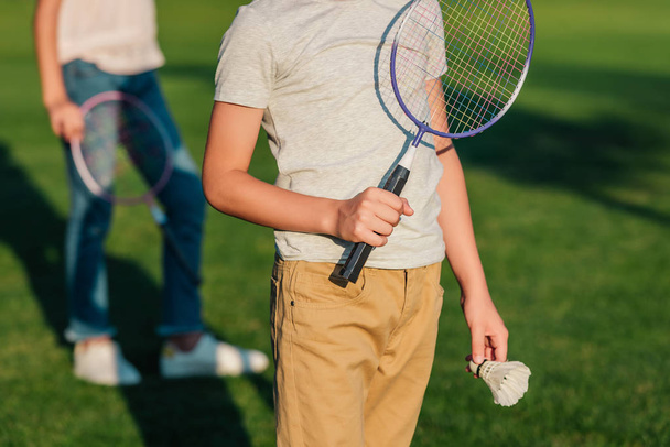child with badminton equipment - Φωτογραφία, εικόνα