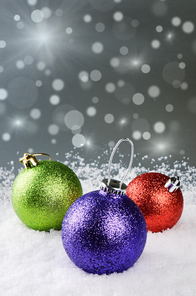 Colorful Christmas baubles on silver background - Photo, Image