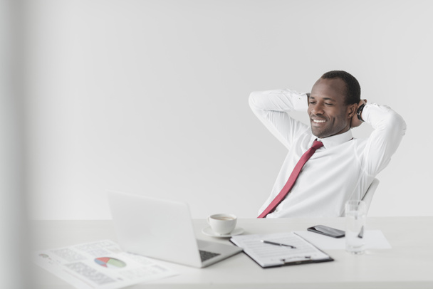 african american businessman resting at workspace - Fotoğraf, Görsel