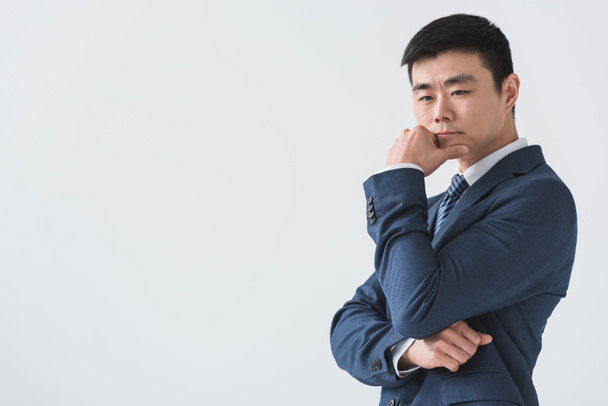 pensive asian businessman  - Foto, Bild
