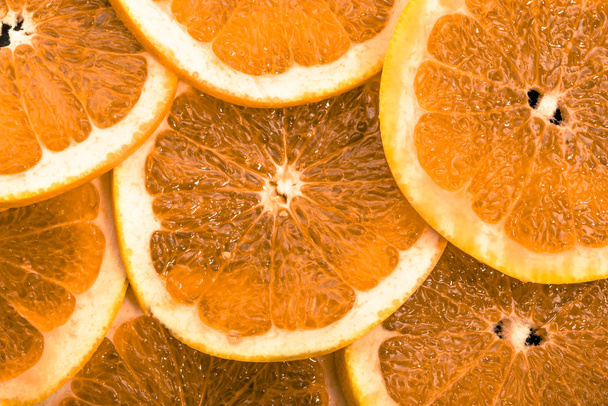Sliced oranges fruit texture, natural background - Foto, Bild