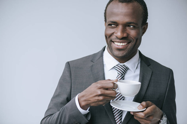 african american businessman with coffee cup - Fotó, kép
