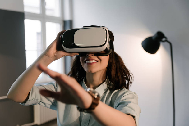 woman using VR-headset glasses. - Φωτογραφία, εικόνα