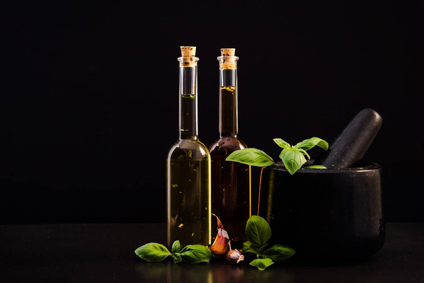 Infused olive oil, pestle and spices - Photo, Image