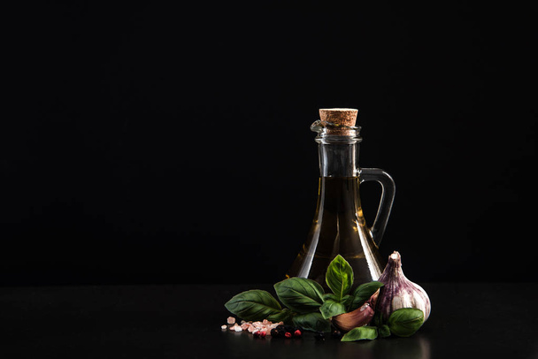 Virgin olive oil with herbs and spices - 写真・画像