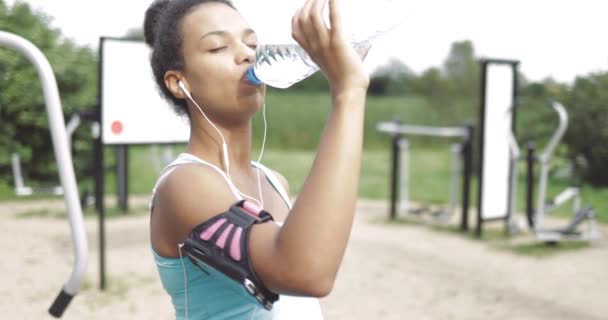 Girl drinking after workout - Footage, Video