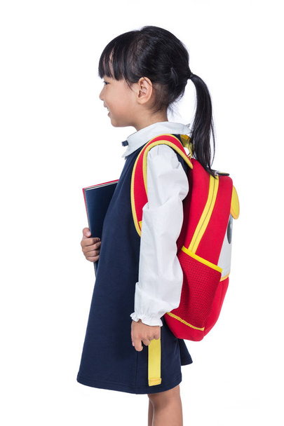 Asian Little Chinese girl in school uniform with school bag - 写真・画像