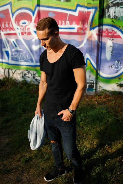 fashion man model on graffity wall - Фото, изображение