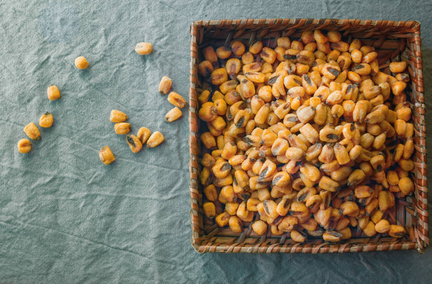 Corn Nuts on tablecloth - Fotoğraf, Görsel