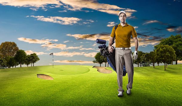 Golf Player in a orange shirt - Foto, imagen