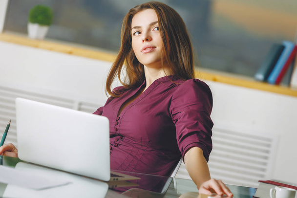 Caucasian female using laptop  - Photo, Image