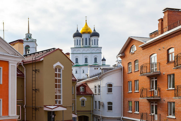 Orthodox church at the background of modern living blocks - Photo, Image