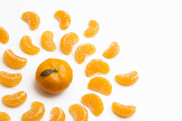 A lot of mandarins on white background - Foto, afbeelding