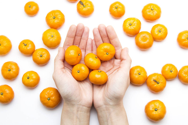 A lot of mandarins on white background - Foto, immagini