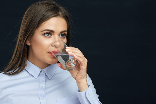 young woman drinking water  - Фото, зображення