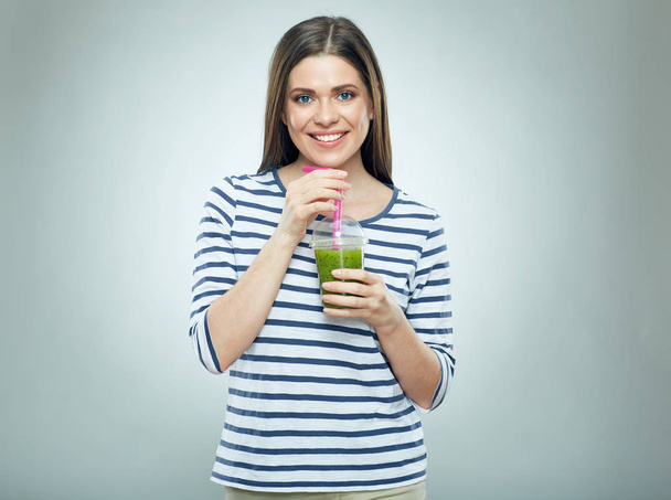 woman holding glass with juice  - Фото, зображення