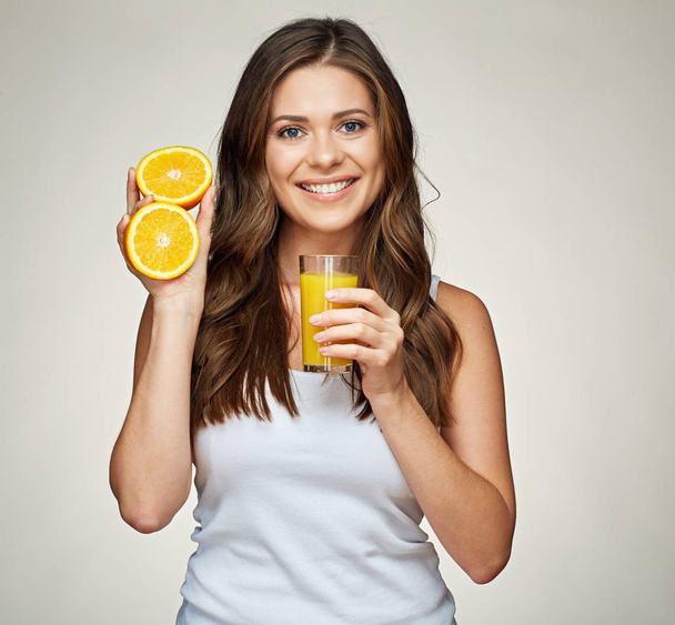 woman holding glass with orange juice  - Foto, Bild