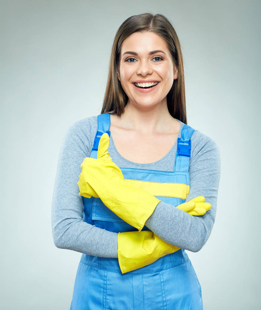 Sorridente donna indossa costruttore uniforme mostra pollice in su
. - Foto, immagini