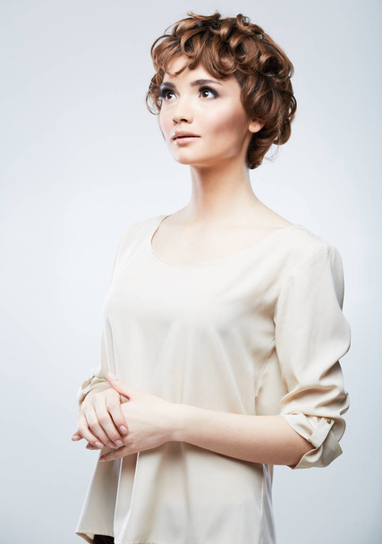 Fashion young model in beige blouse - Fotoğraf, Görsel
