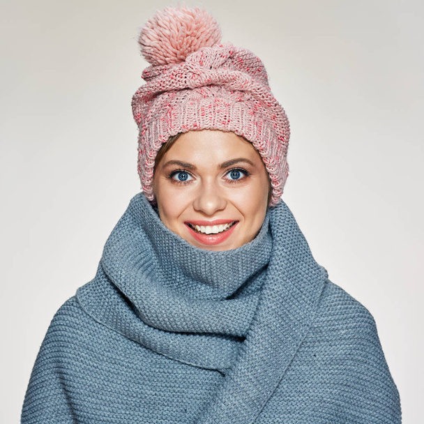 portrait of toothy smiling woman wearing winter scarf and hat  - Фото, зображення