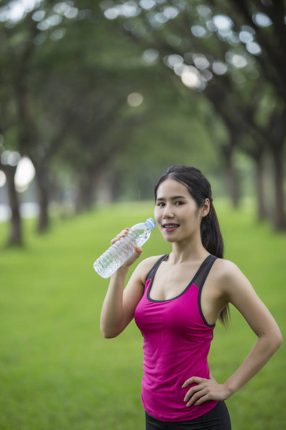woman drink water from the exercise. - Photo, Image