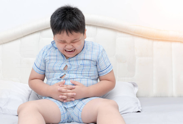 Ожиріння хлопчика надмірна вага болю в ліжку
 - Фото, зображення